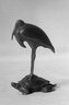 Stork on Back of a Tortoise