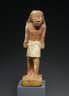 Statuette of a Striding Man