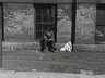 Man Sleeping in Window