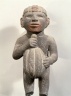 Man Carrying a Cacao Pod