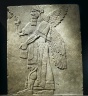 Relief of Winged Man-Headed Figure Facing Right