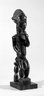 Male Figure Seated on a Stool