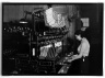 [Untitled]  (Woman at Threading Machine)