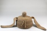 Cap With Topknot and Side Extensions