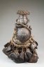 Standing Figure with Seed Pods and Beaks of Hornbill