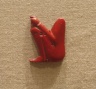 Figure of a Seated Deity in Relief