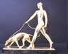 Sculpture of Woman Walking Greyhound