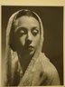[Untitled]  (Brunette Woman Looking to Right Wearing White Lace Shawl on Head)