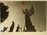 Untitled (Stone Angel Pointing at Airplane)