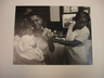 [Untitled] (Maude Callen Giving Shot to Woman Holding Little Girl)