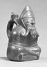 Stirrup Spout Bottle depicting a Man Playing a Panpipe