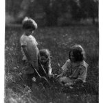 Three Children in the Grass