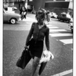 Untitled (Woman with Purse and Portfolio Crossing the Street), from Women are Beautiful Series