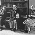 Catholic Workers (Three Women Seated in the Headquaters on Newspaper)