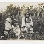 [Untitled] (Two Women with Children Sitting in a Field)