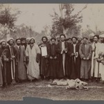 A Group of Religious Men in Religious Garb holding up a Piece of Calligraphy, One of 274 Vintage Photographs