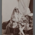 Studio Shot of Young Girl Seated Beside an Open Book,  One of 274 Vintage Photographs