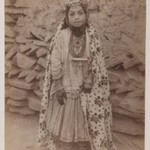 Girl Adorned in Silver Jewelry