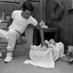 [Untitled] (Man Baby-sitting with Snake)