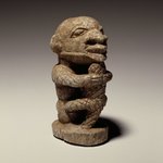 Figure of a Man Holding a Crocodile