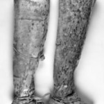 Mans Pair of Thigh-high Boots with red fabric decoration