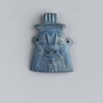 Head of Bes in Relief