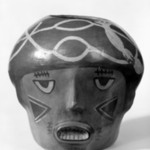 Vessel in Form of a Trophy Head