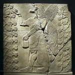 Relief of Eagle-Headed Winged Figure Standing Between Two Sacred Trees