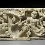 Recarved Plant Scroll with Human Figure and Lion Head