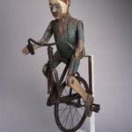 Trade Sign (Boy Riding Bicycle)