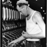 [Untitled] (Man in Cap Holding Thread)