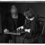 [Untitled] (Seated Portrait of William Rand and Grandaughter Peggy Lee Playing Checkers)