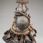 Standing Figure with Seed Pods and Beaks of Hornbill