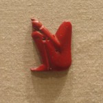 Figure of a Seated Deity in Relief