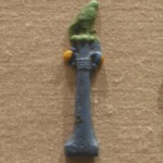Falcon on a Column with Palm Capital