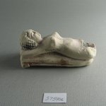 Small Figure of a Woman Lying on a Couch