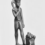 Figure of the Child Horus Standing in Front of a Small Box with Moveable Cover