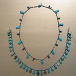 Single Strand Necklace with Hathor Head Beads and a Scarab