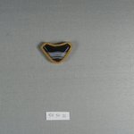 One of Eleven Triangular Stones