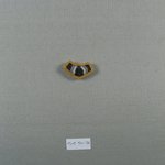 One of Eleven Triangular Stones