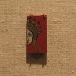 Plaque with Half of a Female Head