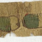 Fragment with Tapestry Strip of Flowers and Ovals