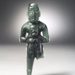 Standing Figure Holding a  Baby